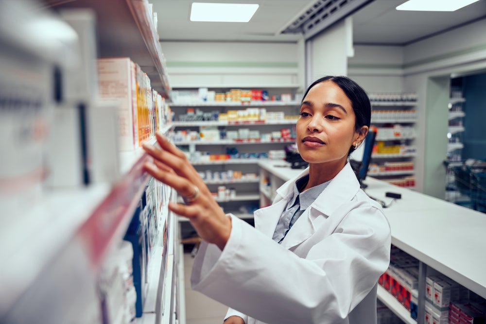 pharmacist working with stock