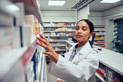 pharmacist working with stock